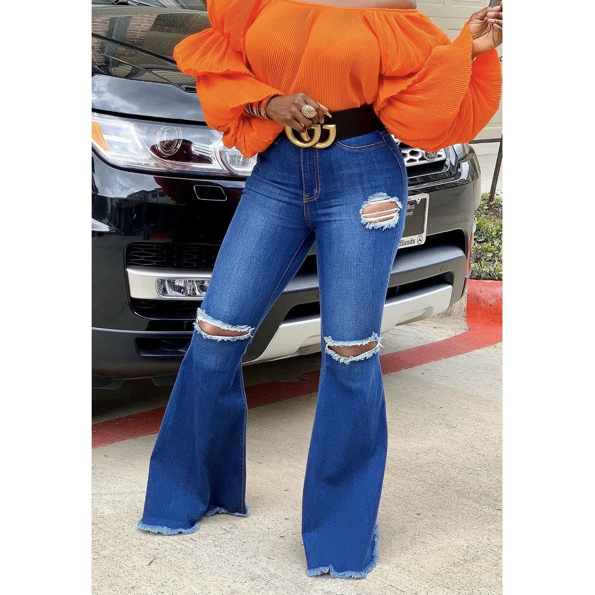 DISTRESSED FLARE JEANS