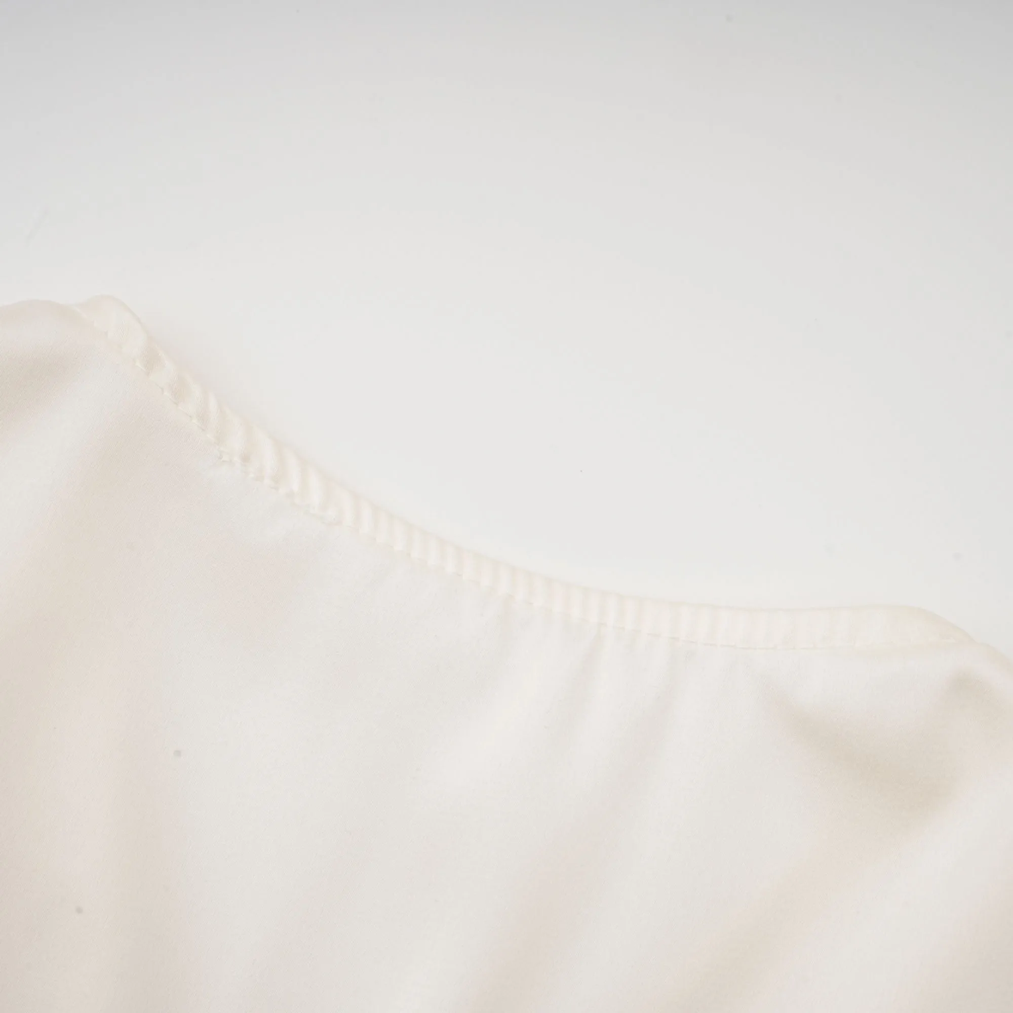 Nouria white faux-flower twist cropped top