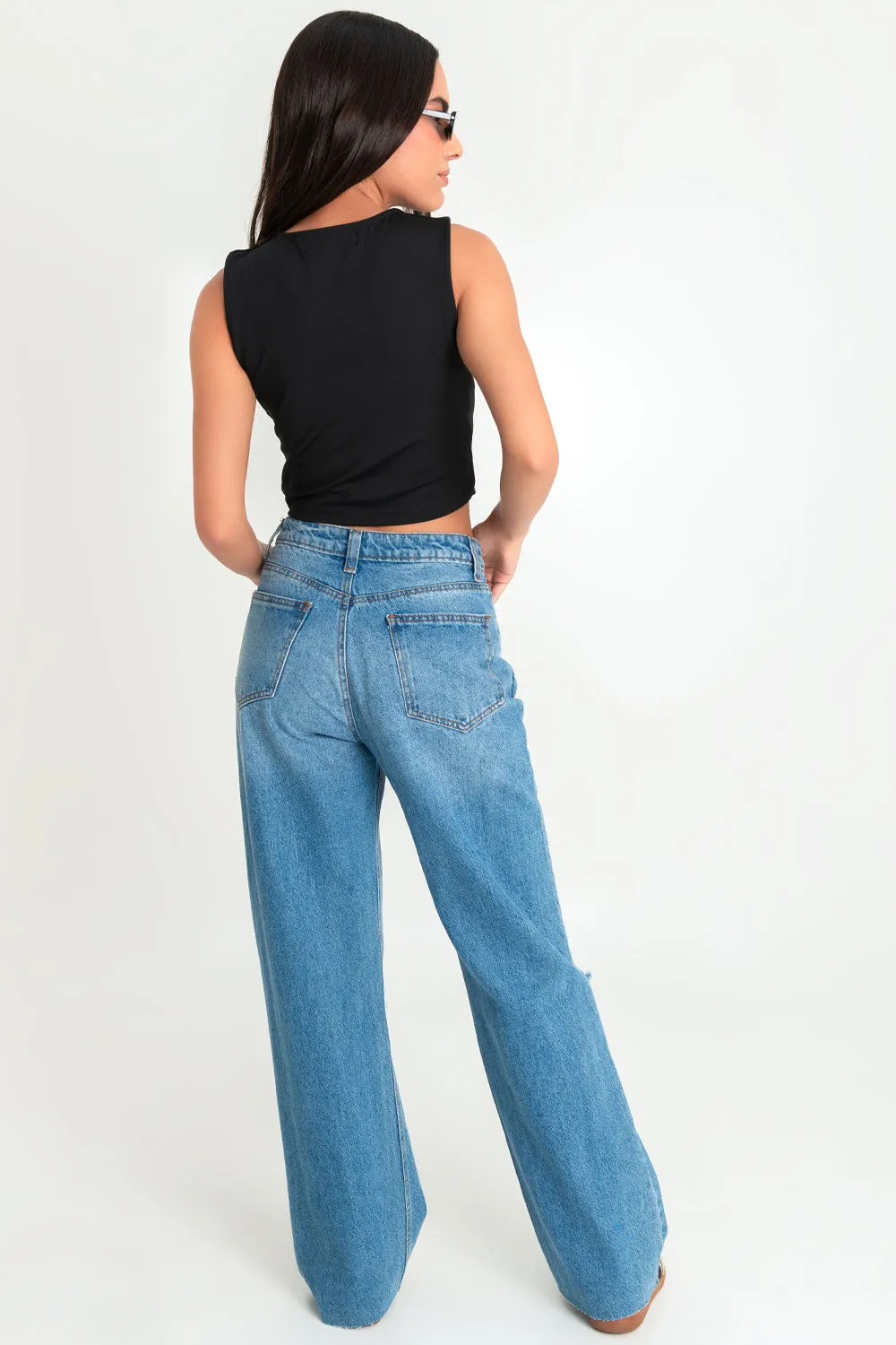Pantalón denim wide leg con rotos