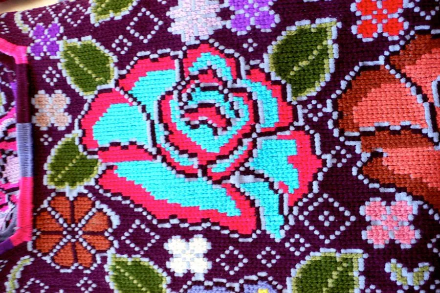 Pink Purple yellow and green cross stitch blouse top .