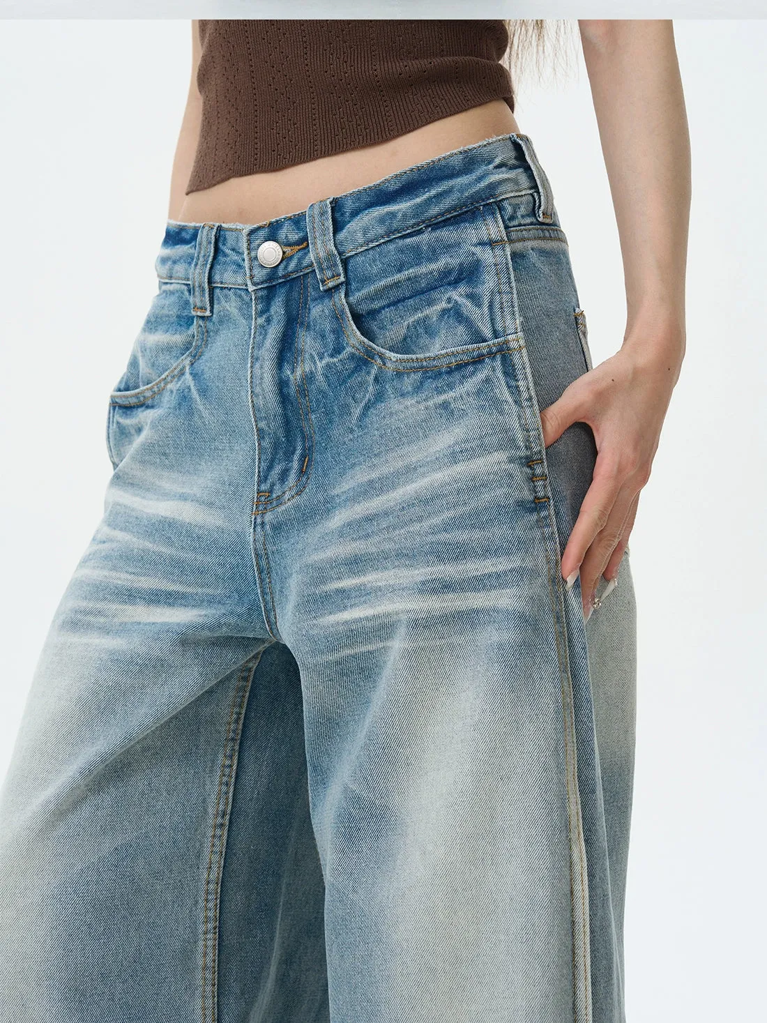 Pleated Wide-Leg Jeans