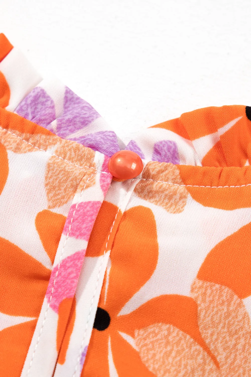 Ruffled Sleeve Smocked Floral Top
